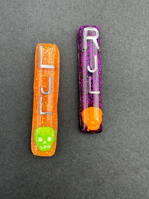 Green and orange skull long Xray Markers Vertical, skulls