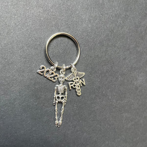 RN Caduceus Key Chain with Skeleton and "2023" Year Charm, RN, Nursing, Gift