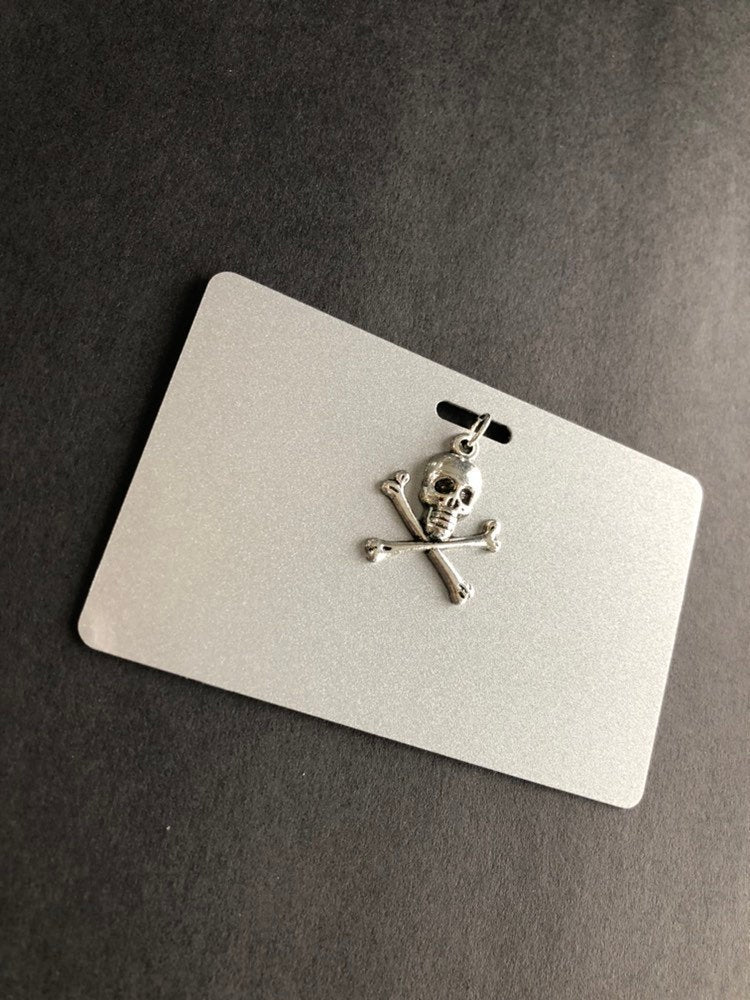 Xray Marker Holder With Skull and Crossbones Charm